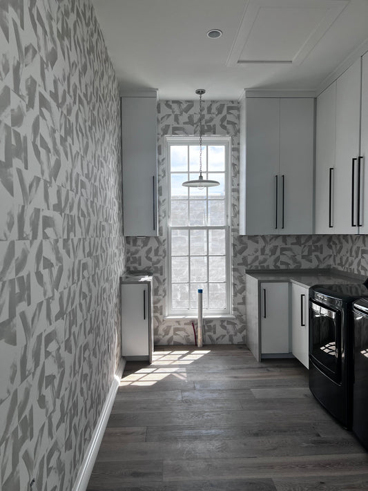 White and gray vinyl wallpaper in laundry